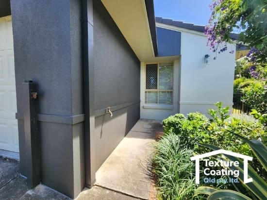 Sideway of cement rendered house in our service area.